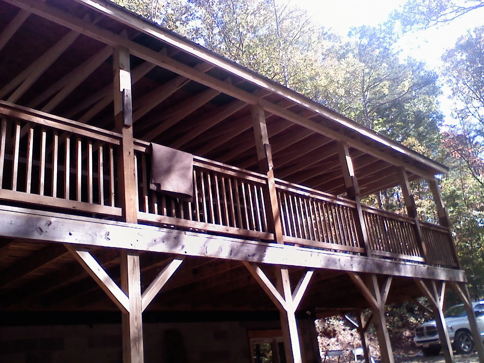Timber framing under a new elevated porch and deck — Roof Leak Repair in Estacada by Roofing Brothers